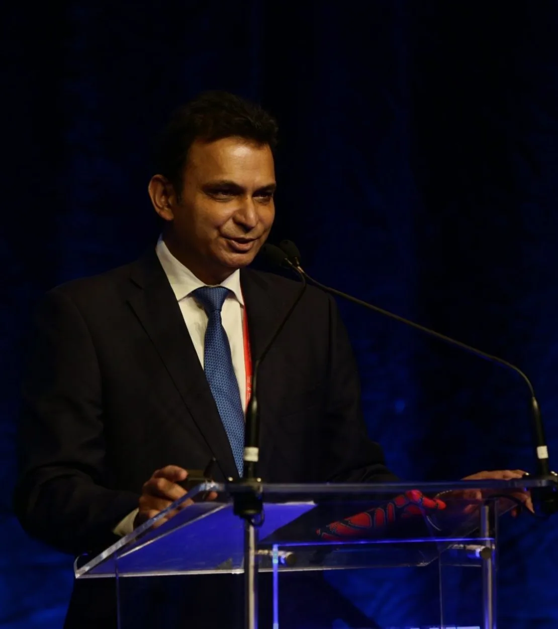 Professor Prokar Dasgupta speaking at a podium