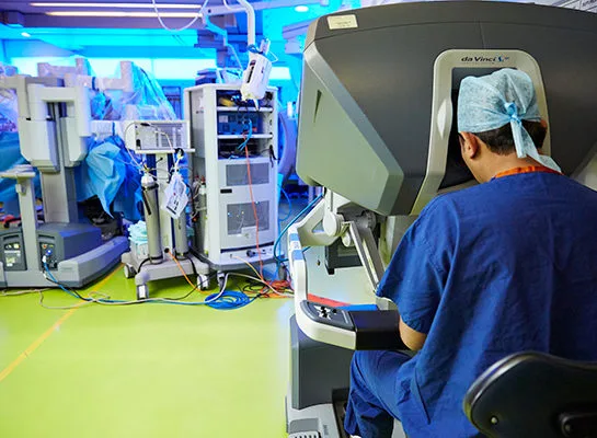 Professor Dasgupta at a da Vinci robotic surgical console