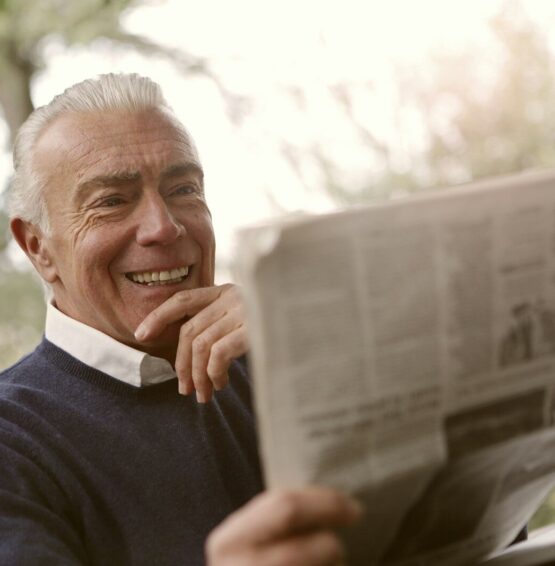 Photo by bruce mars man reading newspaper